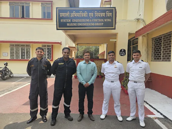 Group photograph outside the Systems Engineering Simulator facility at INS Shivaji