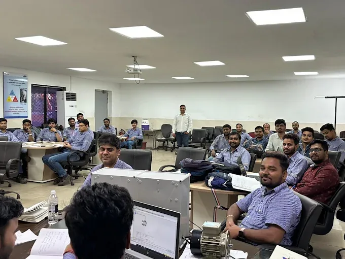 Participants in a computer-based classroom session at JSW Steel, Dolvi