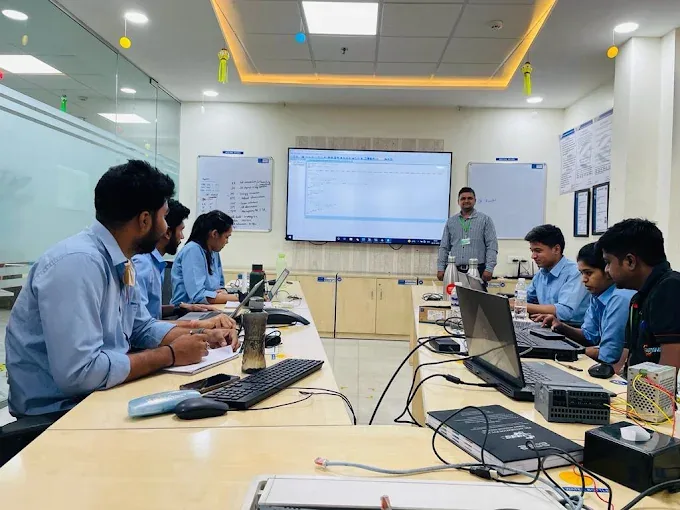 Participants working with laptops during training at Kalyani Forge, Pune