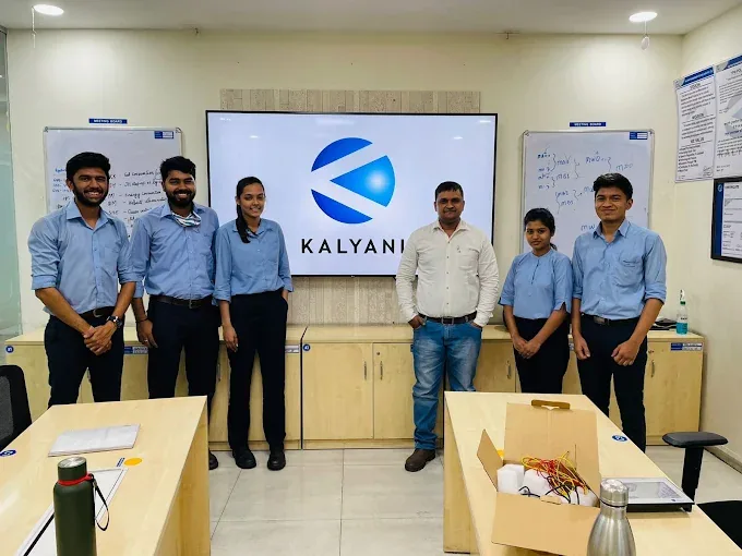 Group photograph in the training room at Kalyani Forge, Pune