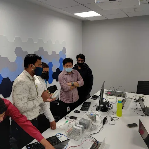 Participants working with training equipment at Qualysis Security